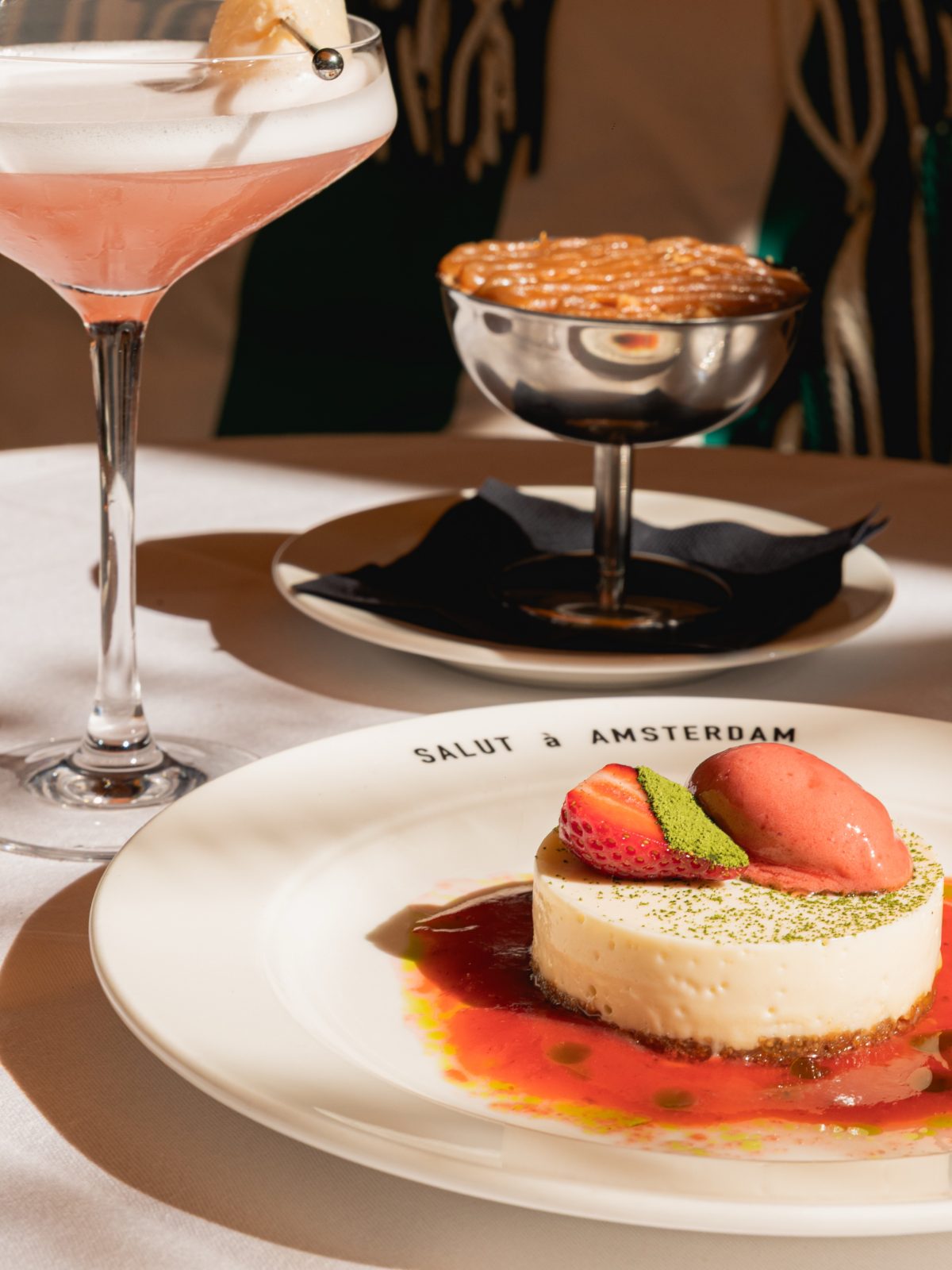 Cheesecake with strawberries and chocolate mousse for dessert at Salut in De Pijp, Amsterdam