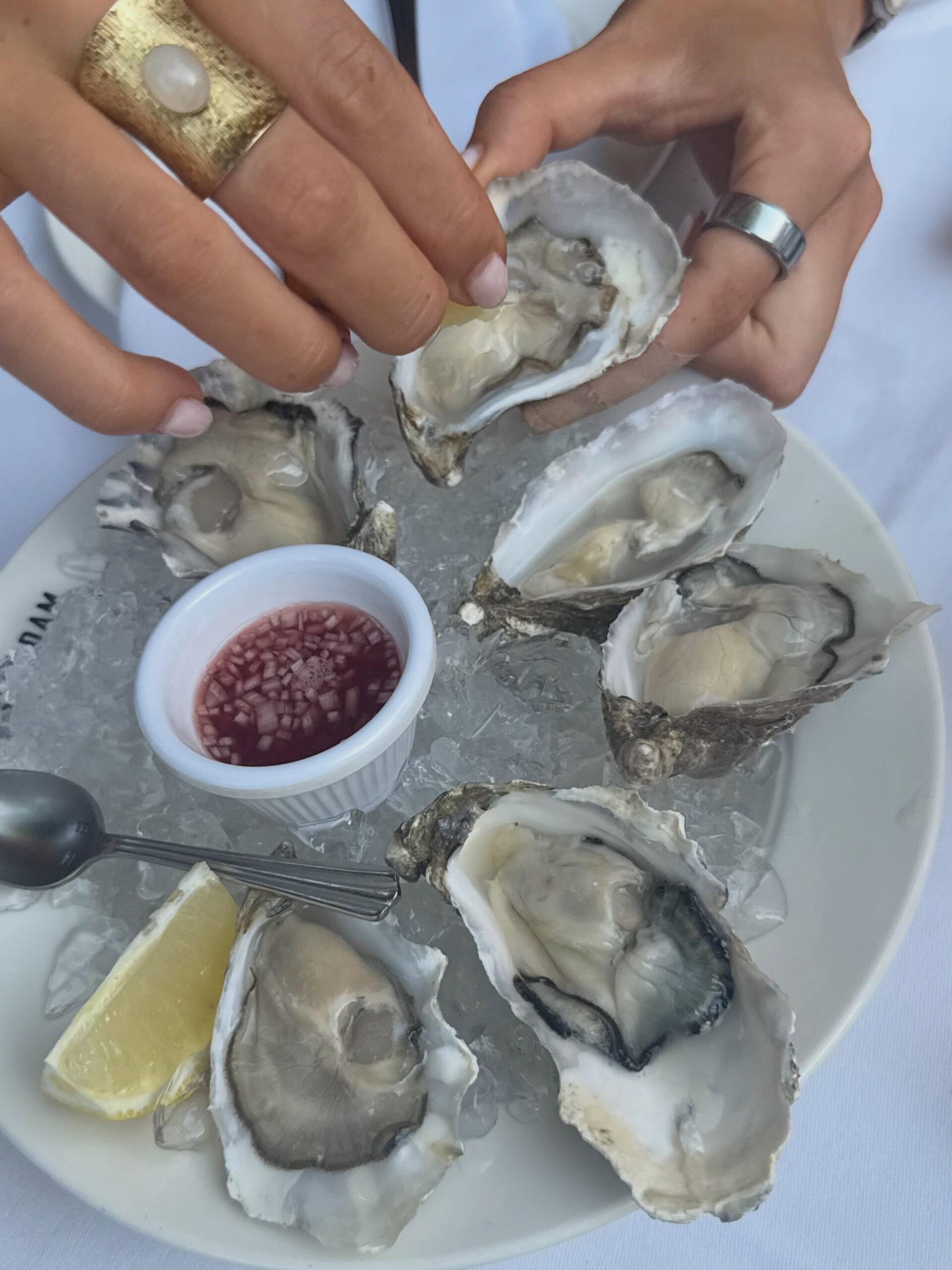Platter of oysters with mignonette and lemon at Salut in De Pijp, Amsterdam